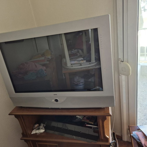 Television with accessories used, old type, functional