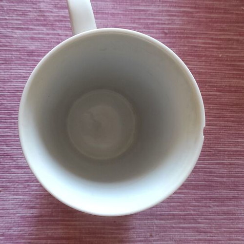 Cup used with slight chip on top edge