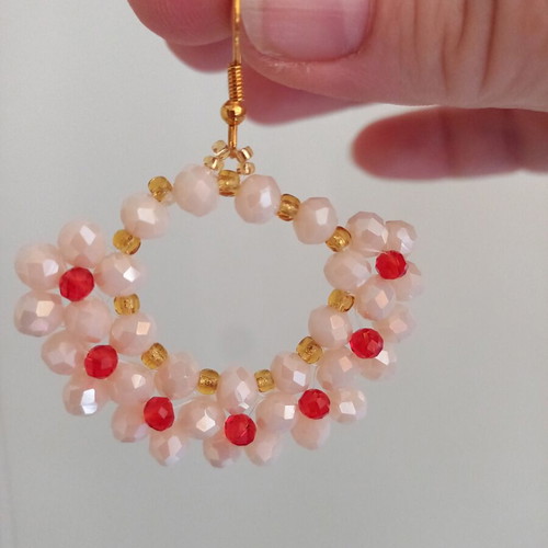Handmade earrings with champagne flowers and red polyhedral beads