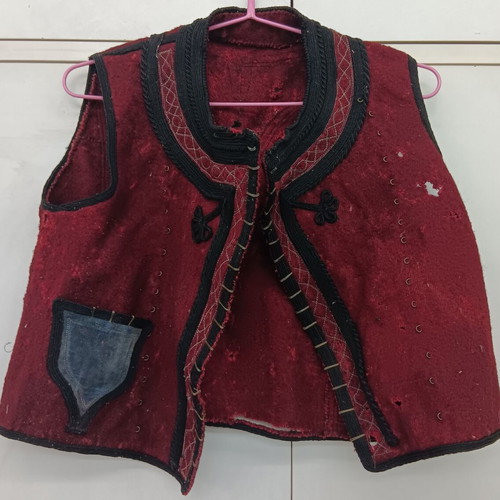 Collectible traditional woolen burgundy vest used