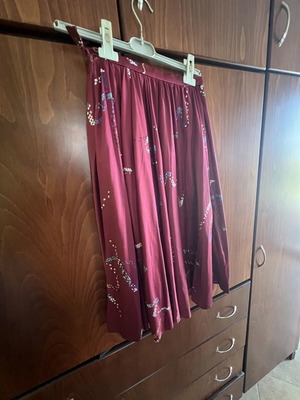 Red women's skirt with unique patterned design, like new, size S