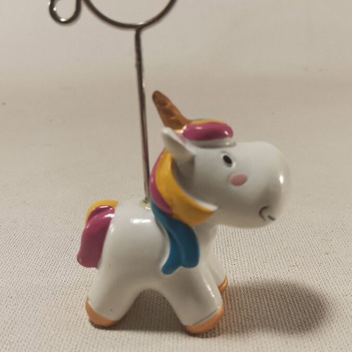 Table stand with unicorn design and metal clip