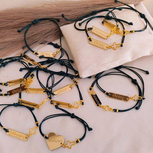 Handmade martyrika bracelets with cord and cross outline