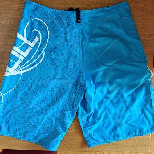 O'Neill Surfer Swim Shorts like new, built-in wax scraper, size M, blue