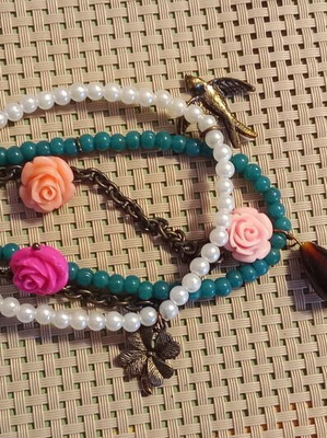 Handmade bracelet with pearls, turquoise beads and charms