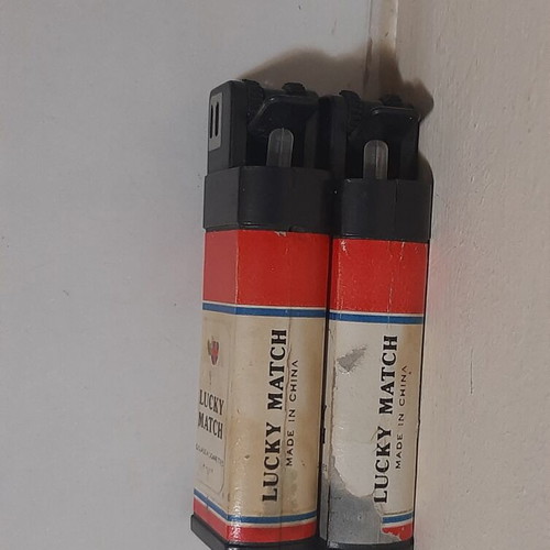 Vintage 80s squirting lighter set of 2 used prank toys
