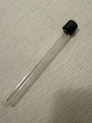 Cylindrical tube like new with secure clasp