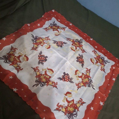 Christmas tablecloth used with yellow stains