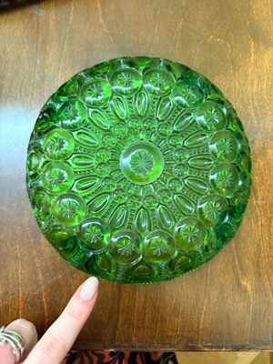 Green vintage glass plate used with embossed mid century design