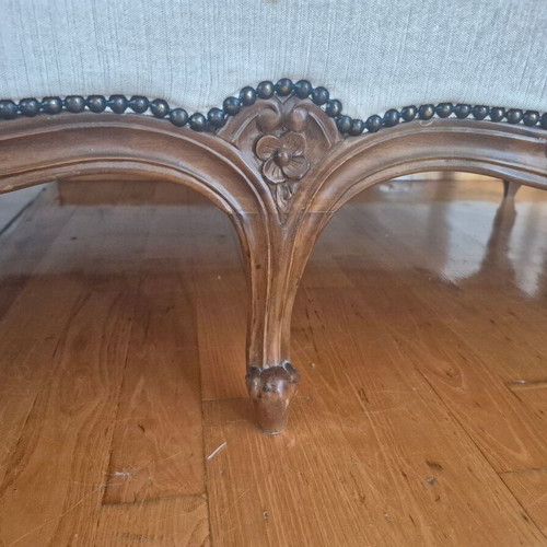 Handmade carved walnut loveseat with cream velvet fabric