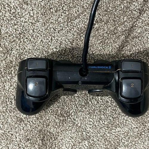 Sony PS2 controller used, non-working for repair or parts