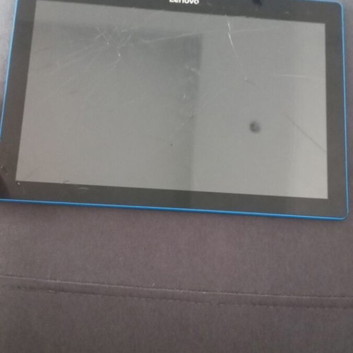 Lenovo tablet used with scratches on screen and back