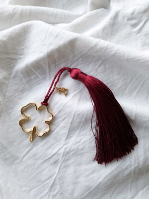Handmade lucky charm with metal elements and tassel made to order