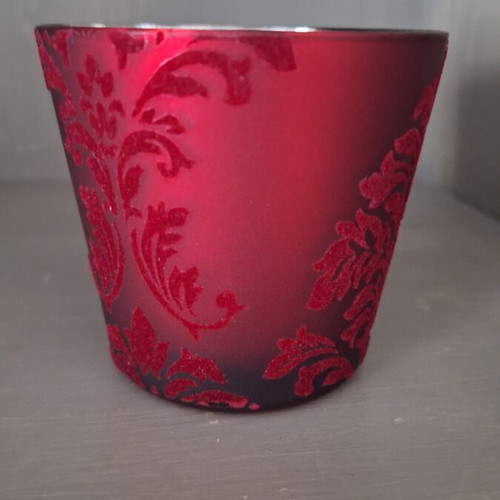 Glass candlestick like new with embossed velvet and silver glazing