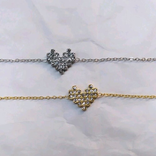Heart bracelet like new, gold color, stainless steel
