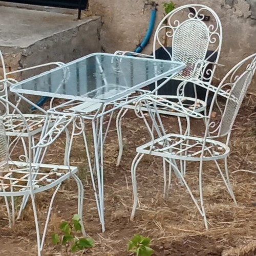 Garden dining set used with four armchairs and fer forze table