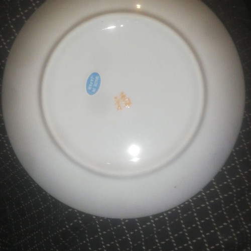 Japanese porcelain plate with gilded flowers, diameter 110 mm