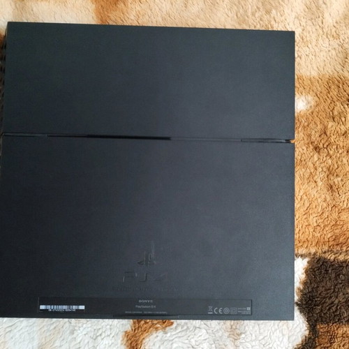 PlayStation 3 slim and PlayStation 4 consoles for repair or parts used
