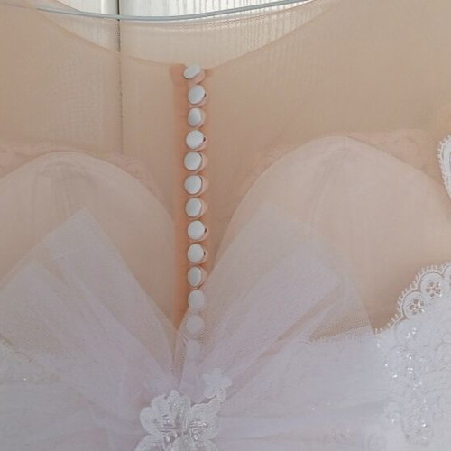 Supernova wedding dress like new, elegant lace details