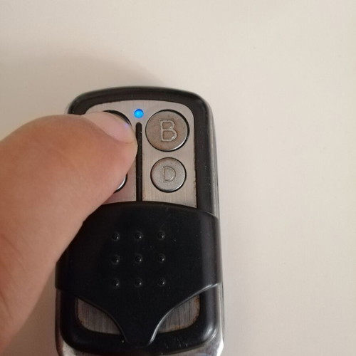 Ucontrol QN-RD008X garage door remote control pack of 2 with new batteries