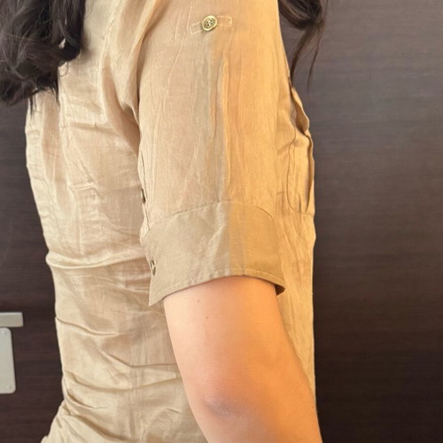 Burberry shirt used in beige satin shade with gold details