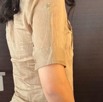 Burberry shirt used in beige satin shade with gold details