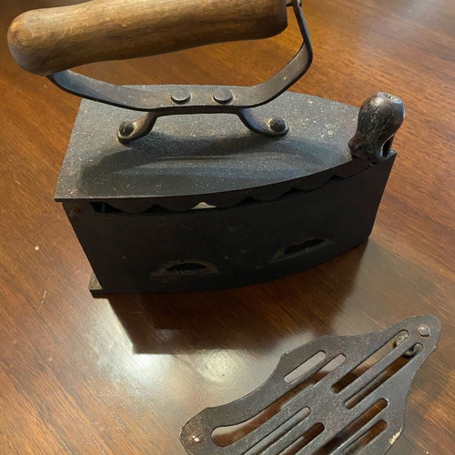 Antique charcoal iron used, cast iron with wooden handle