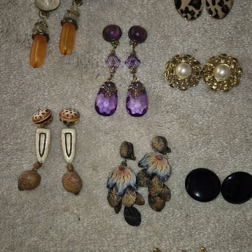 Clip-on earrings used, pack with leather pair