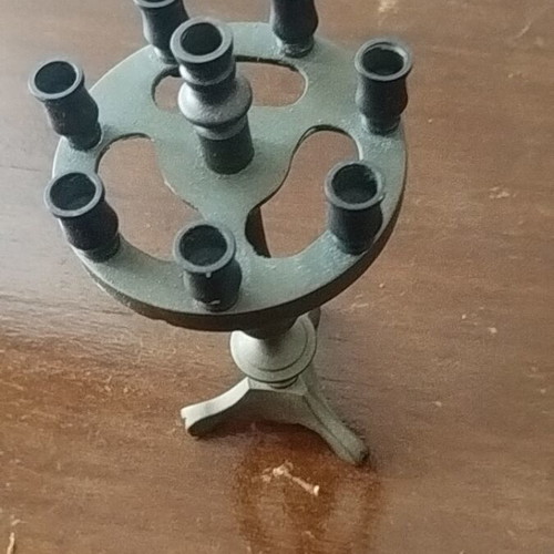 Bronze old candleholder like new, small with eight thin holes, 21 cm