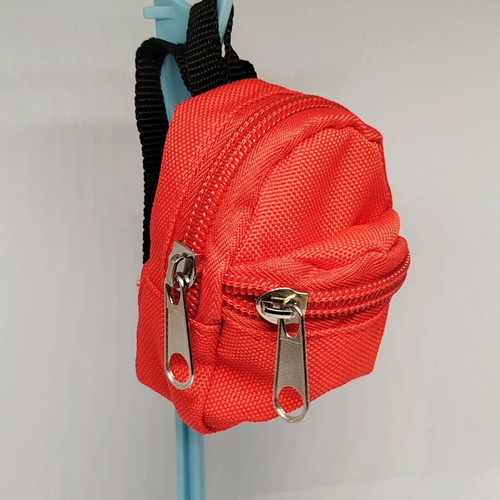 Doll backpack red in excellent condition with 2 compartments