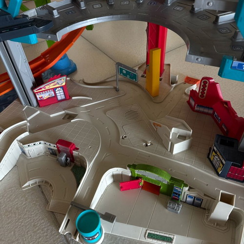 Hot Wheels Mega Garage playset used with Fast Blast Car Park and truck