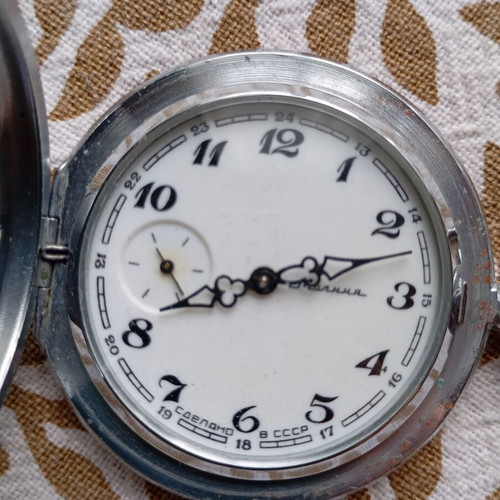 Vintage Molnija pocket watch used, Soviet mechanical hand-winding with embossed design