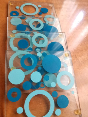 Glass coasters like new, set of 4 with blue details