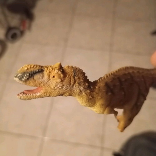 Dinosaur plastic toy like new, miniature