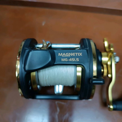 Okuma Magnetix fishing reel like new