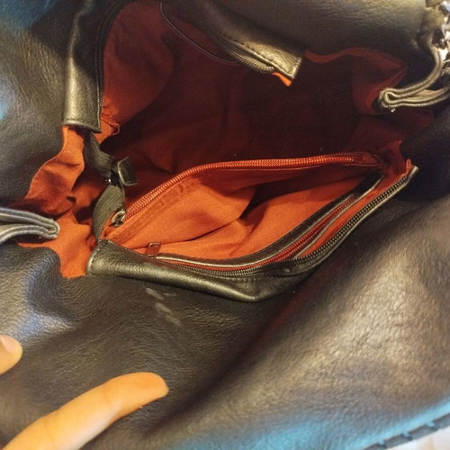 Black shoulder bag like new, synthetic leather with silver chains