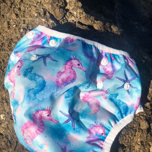 Swim diaper with seahorse and starfish pattern like new, multiple sizes