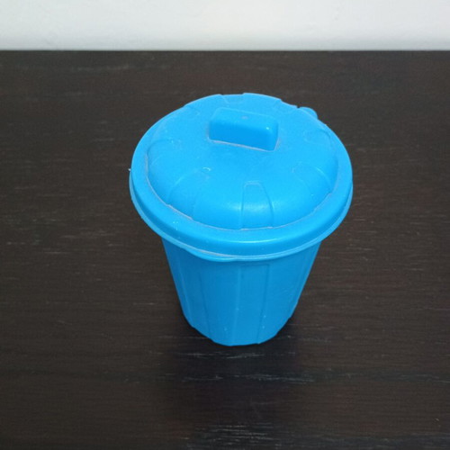 Small blue bin for kids' desk used