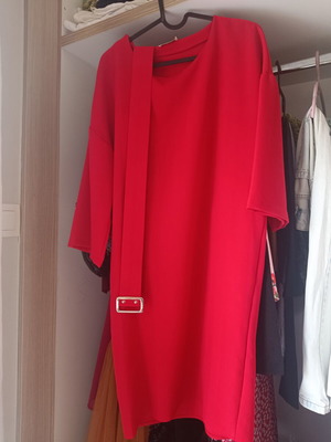 Red women's knee-length dress with trompe-l'oeil sleeves