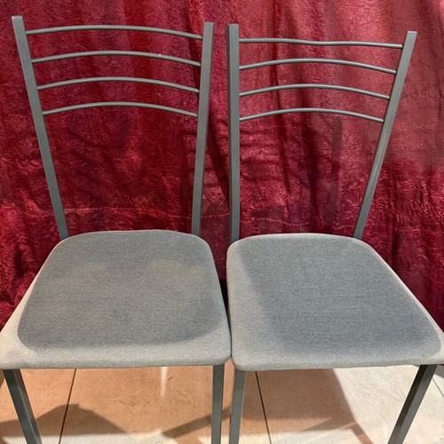 Kitchen chairs used with faded cushions