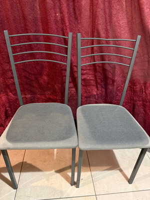 Kitchen chairs used with faded cushions