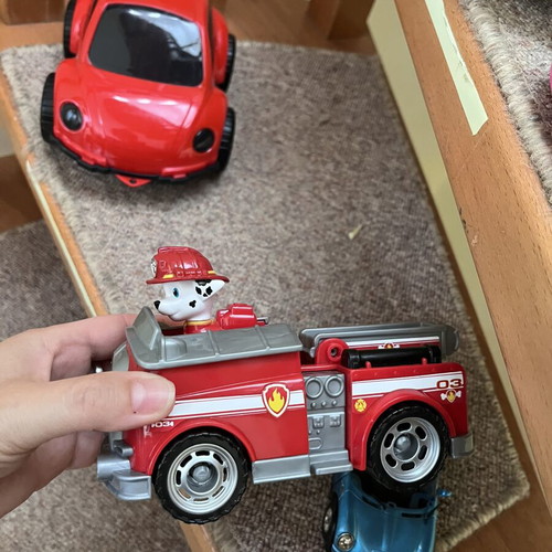 Toy cars, some unused, plastic and metal Mini Cooper