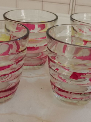 Set of four small ribbed glasses
