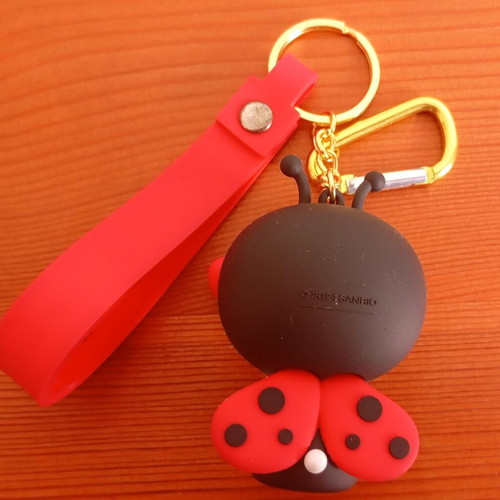 Hello Kitty ladybug keychain like new, black and red