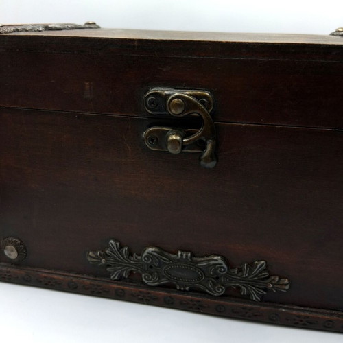 Vintage wooden box with decorative elements like new