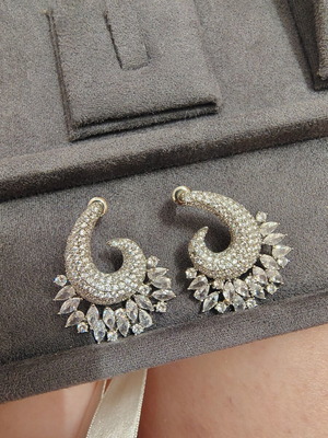 Earrings like new with zircon stones, silver color