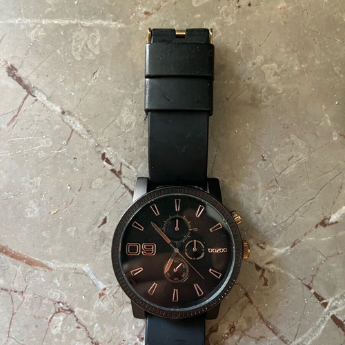 Ouzoo watch used for parts or repair