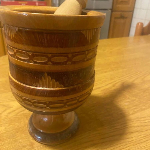 Wooden mortar and pestle used, old