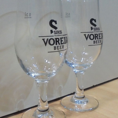 Siris Voreia beer set of two used promotional stemmed glasses 0.3lt