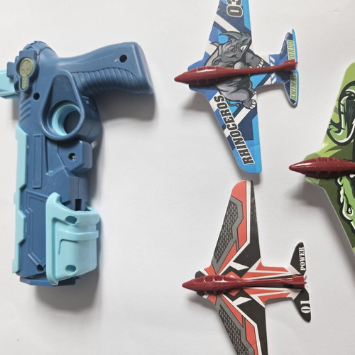 Children's toy gun with paper airplane launcher, new, set of 6 planes